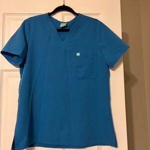 Garde Malade Gabrielle Re-garde  scrub top in blue azur